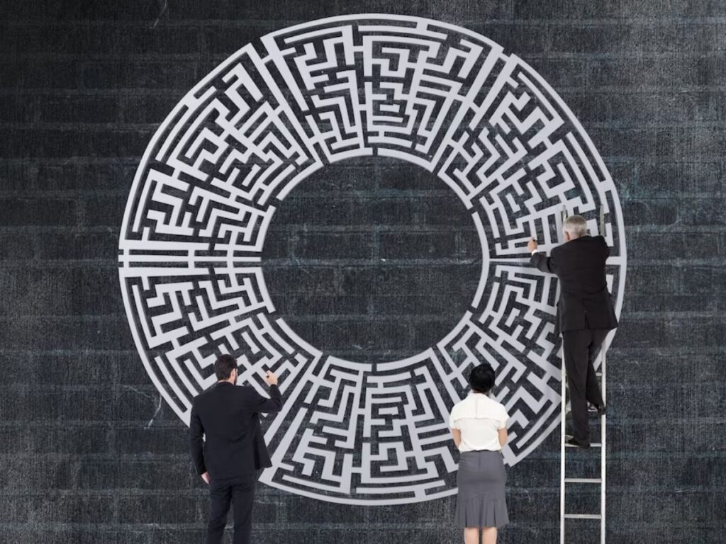Businesspeople Solving Labyrinth