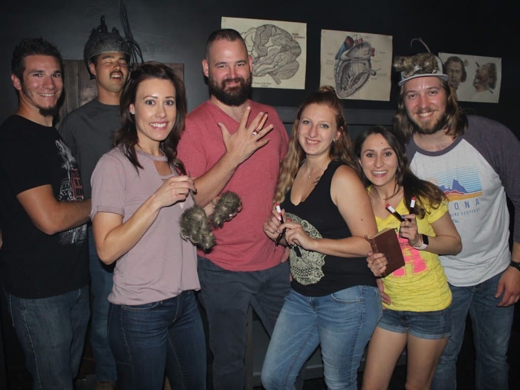 friends happy at escape room